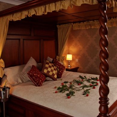 Luxurious Four Poster Bed at the Wessex Hotel in Somerset